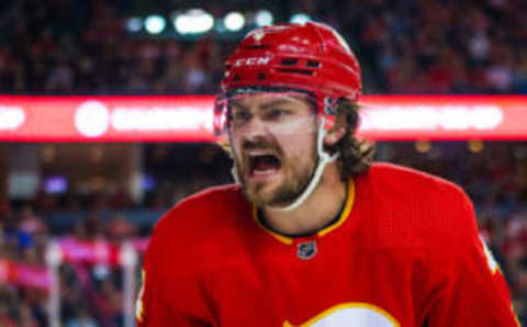 Apr 10, 2023; Calgary, Alberta, CAN; Calgary Flames defenseman Rasmus Andersson (4) reacts to a call by referee during the third period against the Nashville Predators at Scotiabank Saddledome. Mandatory Credit: Sergei Belski-USA TODAY Sports