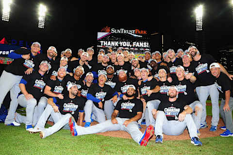 ATLANTA, GA – OCTOBER 08: The Los Angeles Dodgers pose together in celebration of winning Game Four of the National League Division Series with a score of 6-2 over the Atlanta Braves at Turner Field on October 8, 2018 in Atlanta, Georgia. The Dodgers won the series 3-1. (Photo by Scott Cunningham/Getty Images)