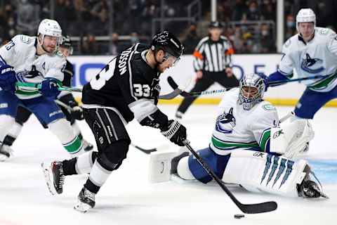 LOS ANGELES, CALIFORNIA – DECEMBER 30: Viktor Arvidsson #33 of the Los Angeles Kings shoots the puck against Jaroslav Halak #41 of the Vancouver Canucks during the second period at Crypto.com Arena on December 30, 2021 in Los Angeles, California. (Photo by Katelyn Mulcahy/Getty Images)