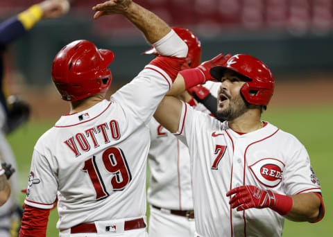 Joey Votto and Eugenio Suarez of the Cincinnati Reds  (Photo by Michael Hickey/Getty Images)