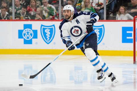 ST PAUL, MN – OCTOBER 15: Dustin Byfuglien #33 of the Winnipeg Jets controls the puck against Minnesota Wild during the game on October 15, 2016 at Xcel Energy Center in St Paul, Minnesota. (Photo by Hannah Foslien/Getty Images)