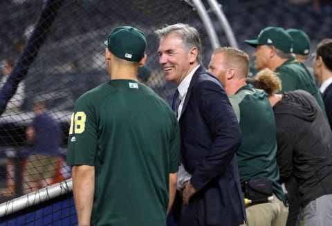 Oakland A’s, Billy Beane, center. Mandatory Credit: Brad Penner-USA TODAY Sports