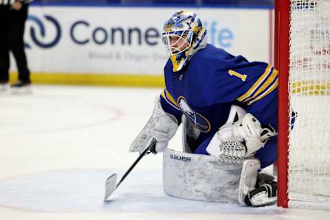 Apr 23, 2021; Buffalo, New York, USA; Buffalo Sabres goaltender Ukko-Pekka Luukkonen (1) looks for the puck during the third period against the Boston Bruins at KeyBank Center. Mandatory Credit: Timothy T. Ludwig-USA TODAY Sports