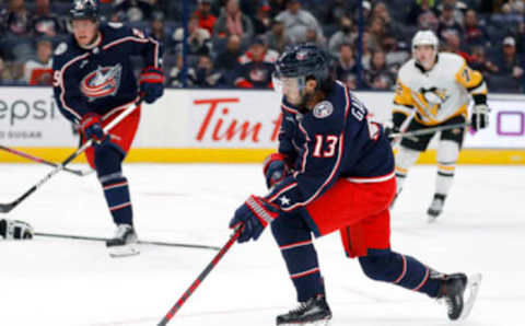 Sep 25, 2022; Columbus, Ohio, USA; Columbus Blue Jackets left wing Johnny Gaudreau (13) shoots the puck during the second period against the Pittsburgh Penguins at Nationwide Arena. Mandatory Credit: Joseph Maiorana-USA TODAY Sports