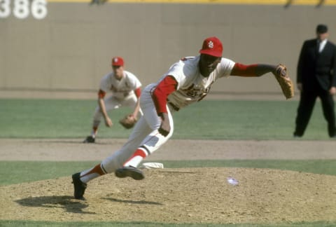 ST. LOUIS, MO – CIRCA 1960’s: Pitcher Bob Gibson #45 of the St. Louis Cardinals follows through on a pitch circa late 1960’s during a Major League Baseball game at Busch Stadium in St. Louis, Missouri. Gibson played for the Cardinals from 1959-75. (Photo by Focus on Sport/Getty Images)