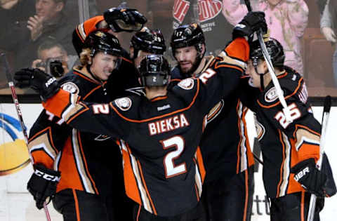 Jan 3, 2016; Anaheim, CA, USA; Anaheim Ducks defenseman Kevin Bieksa (2) and defenseman Hampus Lindholm (47) and center Mike Santorelli (25) and right wing Chris Stewart (29) celebrate a goal by center Ryan Kesler (17) in the second period of the game at Honda Center. Mandatory Credit: Jayne Kamin-Oncea-USA TODAY Sports