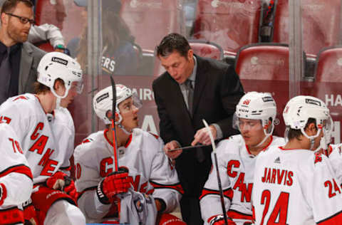 SUNRISE, FL – NOVEMBER 6: Head coach Rod Brind’Amour of the Carolina Hurricanes directs the players during a break in action against the Florida Panthers at the FLA Live Arena on November 6, 2021, in Sunrise, Florida. (Photo by Joel Auerbach/Getty Images)