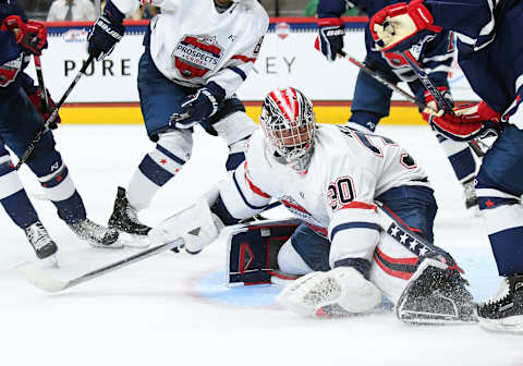 ST. PAUL, MN – SEPTEMBER 19: Team Langenbrunner goalie Spencer Knight (30) kicks the puck into the corner during the USA Hockey All-American Prospects Game between Team Leopold and Team Langenbrunner on September 19, 2018 at Xcel Energy Center in St. Paul, MN. Team Leopold defeated Team Langenbrunner 6-4.(Photo by Nick Wosika/Icon Sportswire via Getty Images)