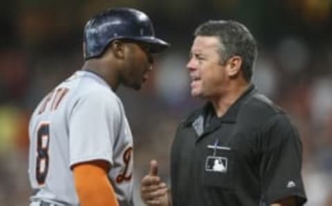 Apr 17, 2016; Houston, TX, USA; Detroit Tigers left fielder Justin Upton (8) talks with home plate umpire Rob Drake after being ejected in the seventh inning against the Houston Astros at Minute Maid Park. Mandatory Credit: Troy Taormina-USA TODAY Sports