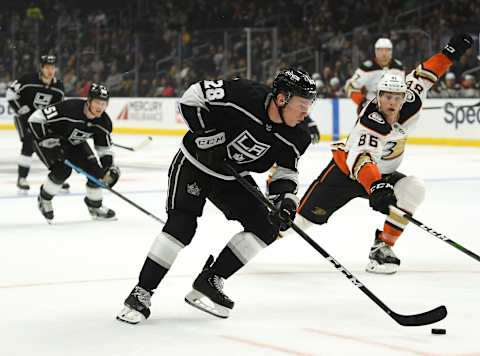 Jaret Anderson-Dolan #28 of the Los Angeles Kings skates past Simon Benoit #86 of the Anaheim Ducks (Photo by Harry How/Getty Images)