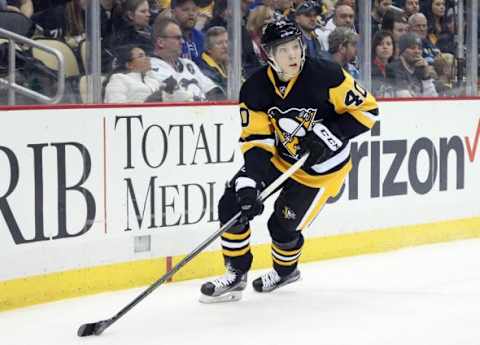 Feb 10, 2016; Pittsburgh, PA, USA; Pittsburgh Penguins center Oskar Sundqvist (40) skates with the puck against the New York Rangers during the first period at the CONSOL Energy Center. The Rangers won 3-0. Mandatory Credit: Charles LeClaire-USA TODAY Sports