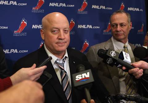 Bill Daly, Deputy Commissioner of the NHL and Steve Fehr of the NHL Players Association (Photo by Bruce Bennett/Getty Images)