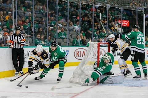 DALLAS, TX – NOVEMBER 16: Boston Bruins right wing David Backes (42) and Dallas Stars center Mattias Janmark (13) battle for the puck behind the net during the game between the Dallas Stars and the Boston Bruins on November 16, 2018 at the American Airlines Center in Dallas, Texas. (Photo by Matthew Pearce/Icon Sportswire via Getty Images)