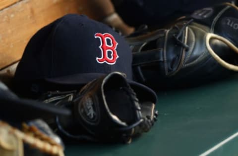 BOSTON, MA – JULY 19: A detail of a Boston Red Sox hat in the dugout during the first inning of the game against the San Francisco Giants at Fenway Park on July 19, 2016 in Boston, Massachusetts. (Photo by Maddie Meyer/Getty Images)