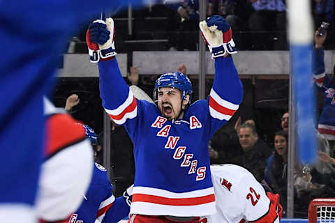 Apr 12, 2022; New York, New York, USA; New York Rangers left wing Chris Kreider (20) celebrates after scoring his 50th goal of the season against the Carolina Hurricanes during the third period at Madison Square Garden. Mandatory Credit: Dennis Schneidler-USA TODAY Sports