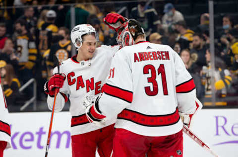 BOSTON, MA – FEBRUARY 10: Frederik Andersen #31 of the Carolina Hurricanes celebrates a 6-0 victory against the Boston Bruins with teammate Sebastian Aho #20 at the TD Garden on February 10, 2022, in Boston, Massachusetts. (Photo by Richard T Gagnon/Getty Images)