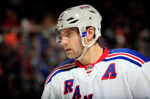 UNIONDALE, NY – MARCH 10: Dan Girardi #5 of the New York Rangers looks on against the New York Islanders during a game at the Nassau Veterans Memorial Coliseum on March 10, 2015 in Uniondale, New York. (Photo by Alex Trautwig/Getty Images)