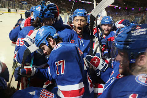 NEW YORK, NEW YORK – MAY 15: Artemi Panarin #10 of the New York Rangers celebrates his game-winning overtime goal against the Pittsburgh Penguins in Game Seven of the First Round of the 2022 Stanley Cup Playoffs at Madison Square Garden on May 15, 2022, in New York City. (Photo by Bruce Bennett/Getty Images)