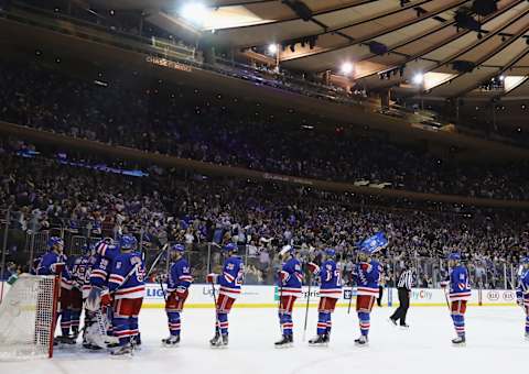 The New York Rangers celebrate a 2-1 victory (Photo by Bruce Bennett/Getty Images)