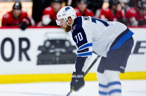 OTTAWA, ON – FEBRUARY 09: Winnipeg Jets defenseman Joe Morrow (70) prepares for a face-off during third period National Hockey League action between the Winnipeg Jets and Ottawa Senators on February 9, 2019, at Canadian Tire Centre in Ottawa, ON, Canada. (Photo by Richard A. Whittaker/Icon Sportswire via Getty Images)