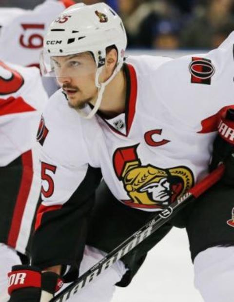 Feb 23, 2016; Edmonton, Alberta, CAN; Ottawa Senators defensemen Erik Karlsson (65) waits for play to start against the Edmonton Oilers at Rexall Place. Mandatory Credit: Perry Nelson-USA TODAY Sports