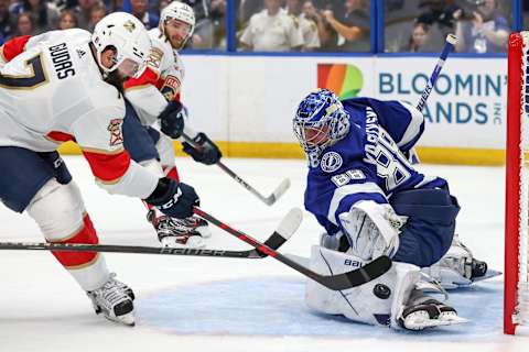 TAMPA, FL – MAY 23: Andrei Vasilevskiy #88 of the Tampa Bay Lightning makes a save against Radko Gudas #7 of the Florida Panthers during the first period in Game Four of the Second Round of the 2022 Stanley Cup Playoffs at Amalie Arena on May 23, 2022 in Tampa, Florida. (Photo by Mike Carlson/Getty Images)