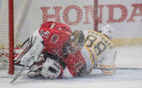 Apr 12, 2017; Ottawa, Ontario, CAN; Boston Bruins right wing David Pastranak (88) collides with Ottawa Senators goalie Craig Anderson (41) in the first period as part of game one of the first round of the 2017 Stanley Cup Playoffs at Canadian Tire Centre. Mandatory Credit: Marc DesRosiers-USA TODAY Sports