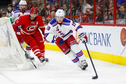 Jan 22, 2016; Raleigh, NC, USA; New York Rangers forward Jesper Fast (19) skates with the puck against the Carolina Hurricanes at PNC Arena. The New York Rangers defeated the Carolina Hurricanes 4-1. Mandatory Credit: James Guillory-USA TODAY Sports