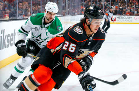 ANAHEIM, CA – APRIL 6: Brandon Montour #26 of the Anaheim Ducks skates with the puck with pressure from Jamie Benn #14 of the Dallas Stars. (Photo by Debora Robinson/NHLI via Getty Images)