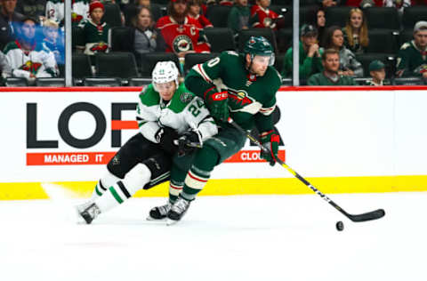 ST. PAUL, MN – SEPTEMBER 20: Dallas Stars center Roope Hintz (24), left, and Minnesota Wild defenseman Carson Soucy (60) fight for the puck during the preseason game between the Dallas Stars and the Minnesota Wild on September 20, 2018 at Xcel Energy Center in St. Paul, Minnesota. The Stars defeated the Wild 3-1. (Photo by David Berding/Icon Sportswire via Getty Images)