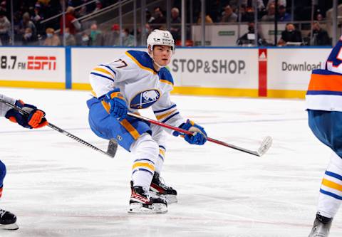 ELMONT, NEW YORK – DECEMBER 30: JJ Peterka #77 of the Buffalo Sabres skates against the New York Islanders at the UBS Arena on December 30, 2021 in Elmont, New York. (Photo by Bruce Bennett/Getty Images)