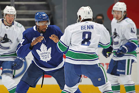 TORONTO, ON – FEBRUARY 4: Jordie Benn #8 of the Vancouver Canucks and Wayne Simmonds #24 of the Toronto Maple Leafs .(Photo by Claus Andersen/Getty Images)