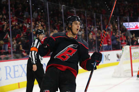 RALEIGH, NC – JANUARY 17: Carolina Hurricanes center Sebastian Aho (20) celebrates a goal during the 1st period of the Carolina Hurricanes game versus the Anaheim Ducks on January 17th, 2020 at PNC Arena in Raleigh, NC (Photo by Jaylynn Nash/Icon Sportswire via Getty Images)