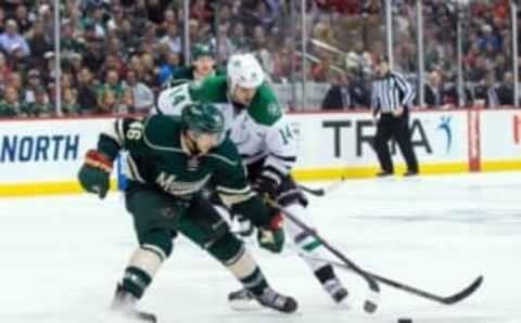 Apr 18, 2016; Saint Paul, MN, USA; Minnesota Wild defenseman Jared Spurgeon (46) defends Dallas Stars forward Jamie Benn (14) in the third period in game three of the first round of the 2016 Stanley Cup Playoffs at Xcel Energy Center. The Minnesota Wild beat the Dallas Stars 5-3. Mandatory Credit: Brad Rempel-USA TODAY Sports