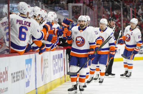 RALEIGH, NC – MAY 01: New York Islanders right wing Jordan Eberle (7) celebrates with players on the bench after a power-play goal during a game between the Carolina Hurricanes and the New York Islanders on May 1, 2019, at the PNC Arena in Raleigh, NC. (Photo by Greg Thompson/Icon Sportswire via Getty Images)