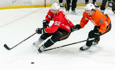 ANAHEIM, CA – SEPTEMBER 06: Left center Benoit-Olivier Groulx #50 and right winger Kiefer Sherwood #64 of the Anaheim Ducks race for the puck during the Anaheim Ducks Rookie Camp at Anaheim ICE in Anaheim on Thursday, September 6, 2018. (Photo by Leonard Ortiz/Digital First Media/Orange County Register via Getty Images)