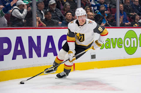 Apr 12, 2022; Vancouver, British Columbia, CAN; Vegas Golden Knights forward Jack Eichel (9) handles the puck against the Vancouver Canucks in the second period at Rogers Arena. Mandatory Credit: Bob Frid-USA TODAY Sports