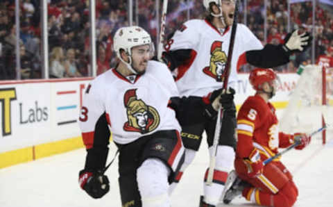 CALGARY, CANADA – FEBRUARY 27: Mika Zibanejad #65 of the Ottawa Senators celebrates his hat trick goal in the third period with Mike Hoffman #68 during their NHL game against the Calgary Flames at the Scotiabank Saddledome on February 27, 2016 in Calgary, Alberta, Canada. (Photo by Tom Szczerbowski/Getty Images)