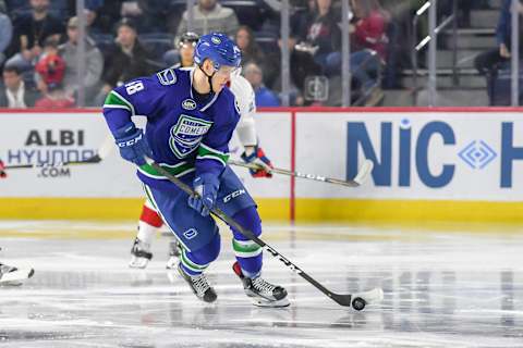 LAVAL, QC, CANADA – NOVEMBER 3: Olli Juolevi #48 of the Utica Comets skating up the ice with the puck against the Laval Rocket at Place Bell on November 3, 2018 in Laval, Quebec. (Photo by Stephane Dube /Getty Images)