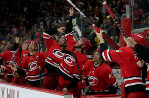 RALEIGH, NC – MARCH 19: Justin Williams #14 of the Carolina Hurricanes and teammates Jordan Staal and Jaccob Slavin #74 participate in the Storm Surge following a victory over the Pittsburgh Penguins during an NHL game on March 19, 2019 at PNC Arena in Raleigh, North Carolina. (Photo by Gregg Forwerck/NHLI via Getty Images)