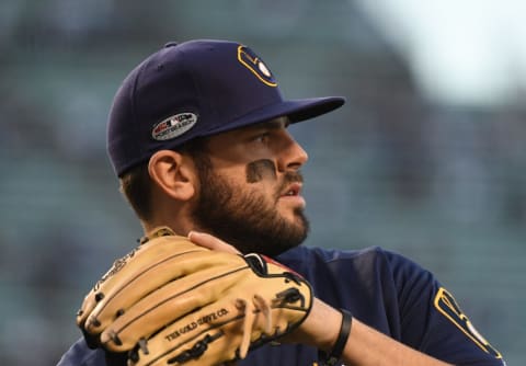 LOS ANGELES, CA – OCTOBER 16: Mike Moustakas #18 of the Milwaukee Brewers warms up prior to the start of Game Four of the National League Championship Series against the Los Angeles Dodgers at Dodger Stadium on October 16, 2018 in Los Angeles, California. (Photo by Harry How/Getty Images)