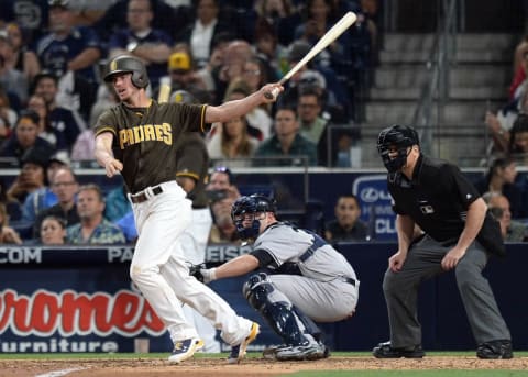 Jul 1, 2016; San Diego, CA, USA; San Diego Padres first baseman Wil Myers (4) singles during the seventh inning against the New York Yankees at Petco Park. Mandatory Credit: Jake Roth-USA TODAY Sports