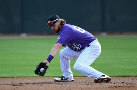 SCOTTSDALE, CO – FEBRUARY 19: Colorado Rockies Brendan Rodgers (65) backhands a grounder during the teams workout on February 19, 2018 at Salt River Fields at Talking Stick in Scottsdale, Arizona. (Photo by John Leyba/The Denver Post via Getty Images)