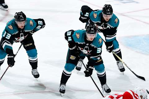 ANAHEIM, CA – OCTOBER 8: Jakob Silfverberg #33, Sam Steel #34, and Cam Fowler #4 of the Anaheim Ducks line up for a face-off during the game against the Detroit Red Wings on October 8, 2018 at Honda Center in Anaheim, California. (Photo by Debora Robinson/NHLI via Getty Images)