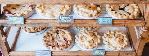 Pies on the shelf at Two Fat Cats Bakery in Maine.