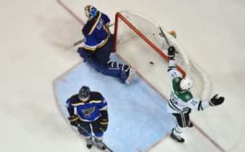 May 5, 2016; St. Louis, MO, USA; Dallas Stars left wing Patrick Sharp (10) celebrates after the game winning goal scored by Cody Eakin (not pictured) against St. Louis Blues goalie Brian Elliott (1) during the overtime period in game four of the second round of the 2016 Stanley Cup Playoffs at Scottrade Center. The Dallas Stars defeat the St. Louis Blues 3-2. Mandatory Credit: Jasen Vinlove-USA TODAY Sports