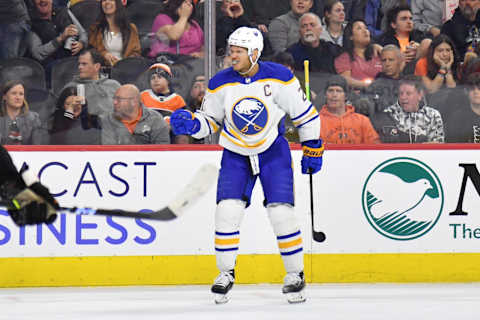 Apr 1, 2023; Philadelphia, Pennsylvania, USA; Buffalo Sabres right wing Kyle Okposo (21) reacts after scoring a goal against the Philadelphia Flyers during the first period at Wells Fargo Center. Mandatory Credit: Eric Hartline-USA TODAY Sports