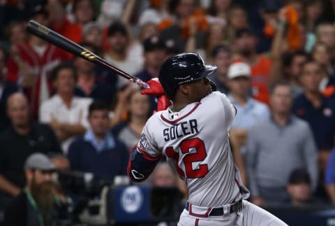 Nov 2, 2021; Houston, TX, USA; Atlanta Braves designated hitter Jorge Soler (12) hits a three-run home run against the Houston Astros during the third inning in game six of the 2021 World Series at Minute Maid Park. Mandatory Credit: Troy Taormina-USA TODAY Sports