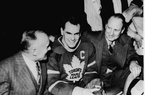 Head coach C.H. Day, Syl Apps, and team manager Conn Smythe of the Toronto Maple Leafs celebrate their Stanley Cup victory over the Detroit Red Wings in 1948.  (Photo by Bruce Bennett Studios via Getty Images Studios/Getty Images)