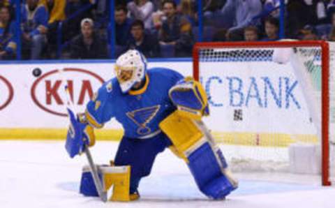 Mar 25, 2017; St. Louis, MO, USA; St. Louis Blues goalie Jake Allen (34) blocks a shot during the first period against the Calgary Flames at Scottrade Center. (Billy Hurst-USA TODAY Sports)